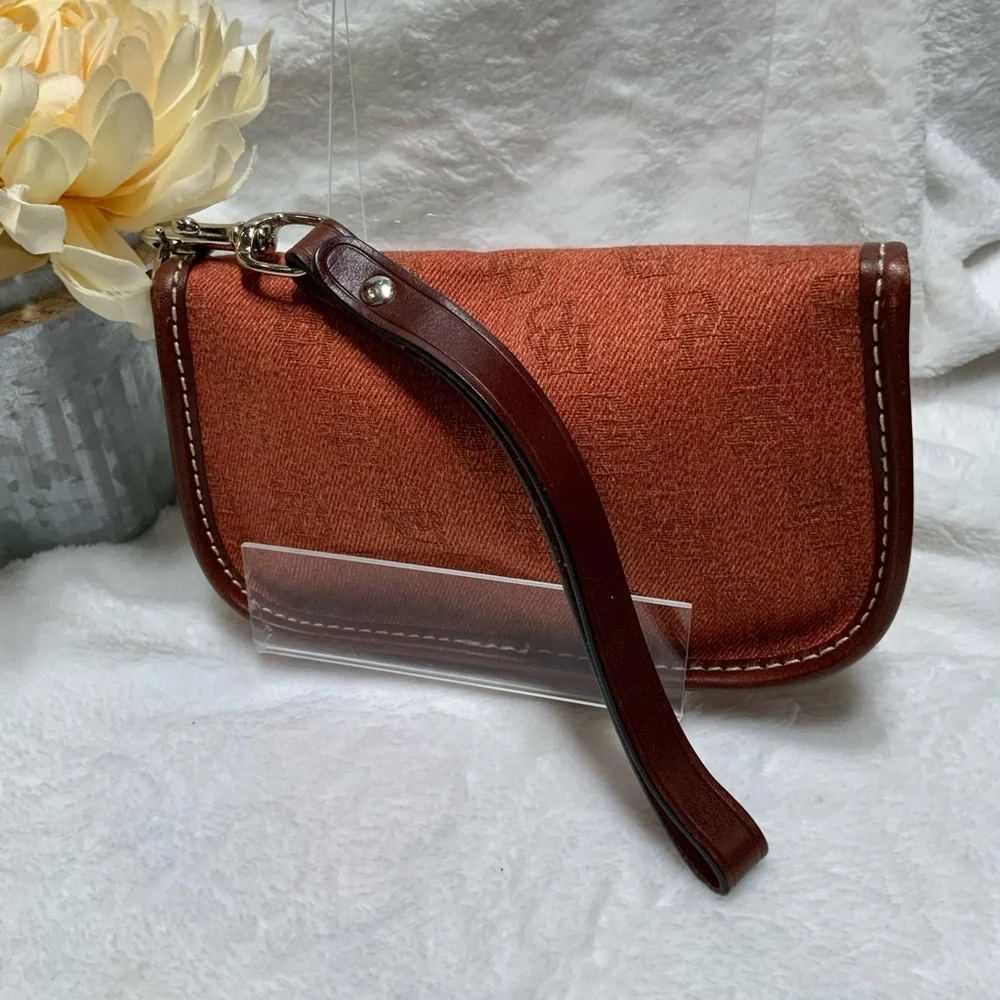 Dooney & Bourke Rust Clutch with Wristlet - Picture 2 of 5